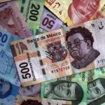 Mexican peso slides, Canadian dollar weakens as Trump imposes tariffs on Colombia